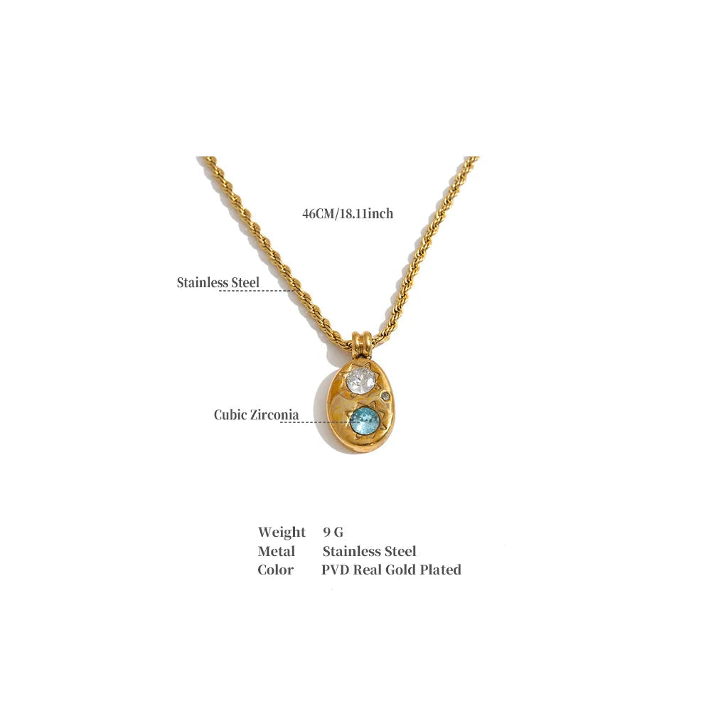 The Alba Necklace: aqua zircon, starburst details, twisted rope chain. Silver or gold. Tarnish-free, everyday.