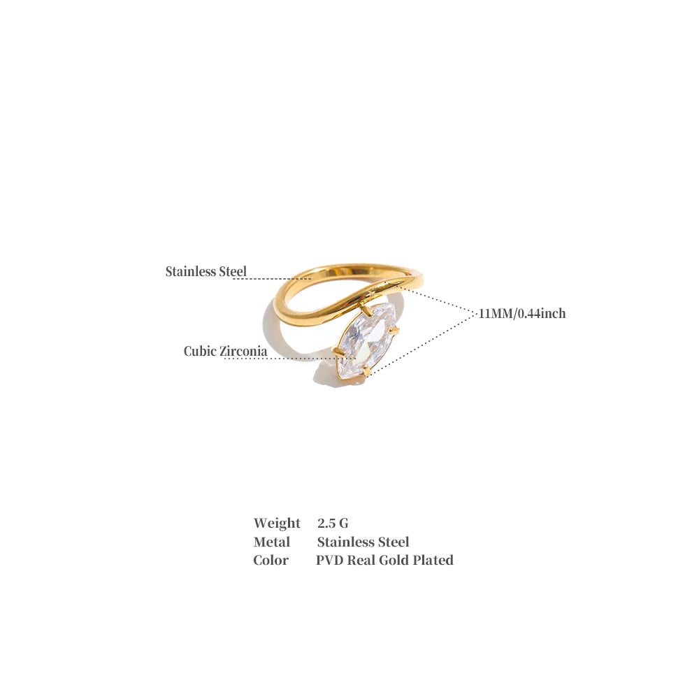 A gold-plated cubic zirconia ring with stainless steel settings, shown with measurement callouts and product specifications on a white background.