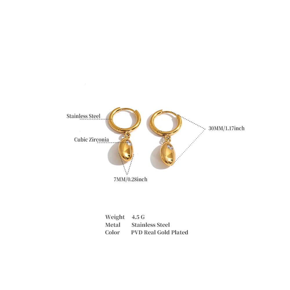 Shop the Helena Earrings: hinged huggies with a smooth oval drop and zircon accent. Waterproof stainless steel, silver or 18k gold.