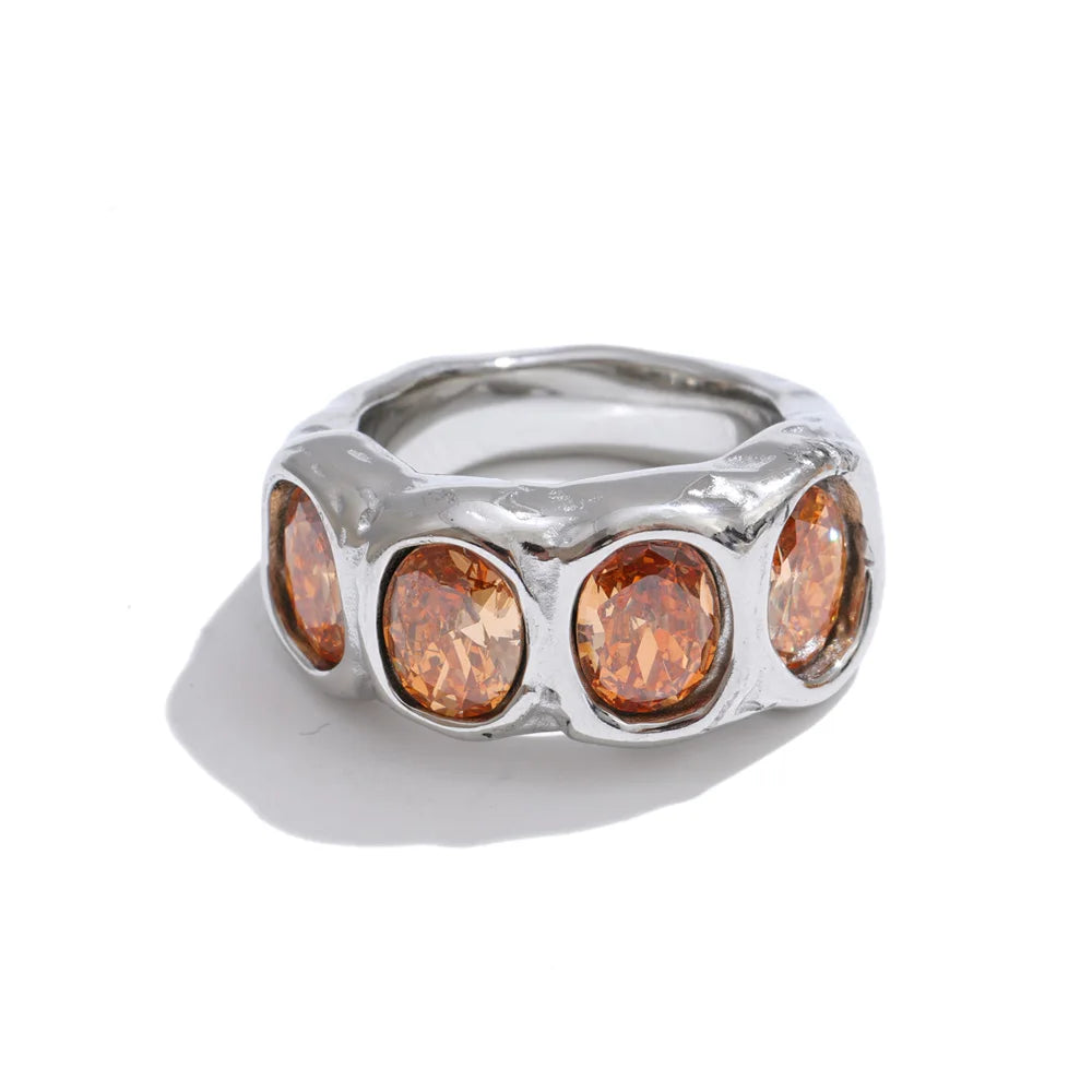 Maisie Ring – chunky hammered band with oval champagne zircons. Sizes 6-8. Tarnish-free stainless steel, silver or gold-tone. Bold statement.