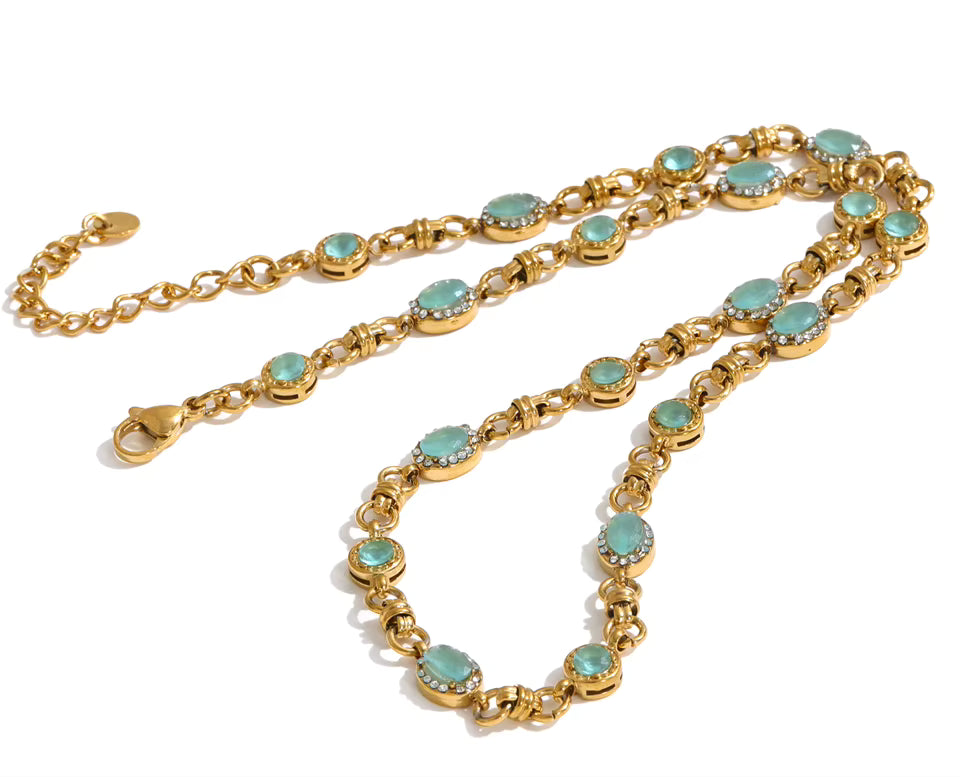 Vintage-inspired Vivienne Necklace: gold link chain with aqua-green stones and zircon halos. Tarnish-free stainless steel, adjustable fit.