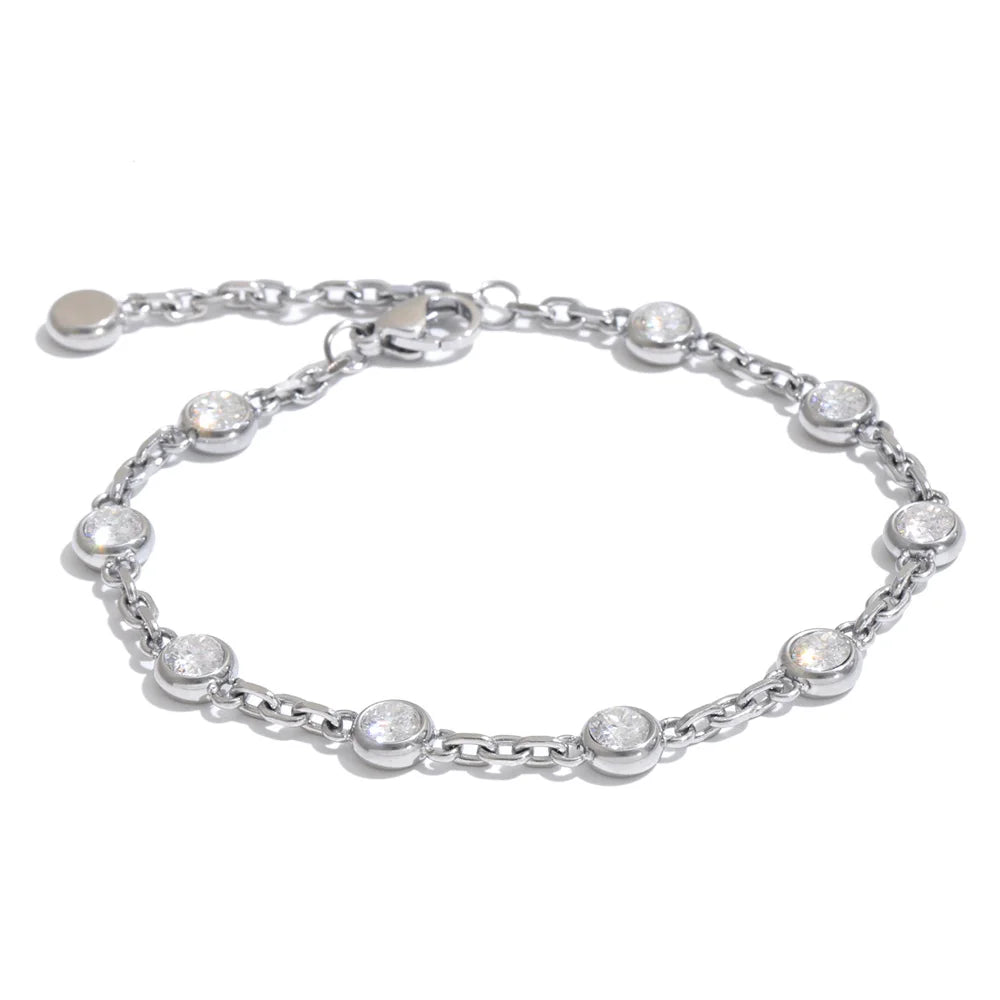 April Bracelet – dainty cable chain with bezel-set zircons. Tarnish-free stainless steel, silver or gold-tone. Adjustable, everyday sparkle.