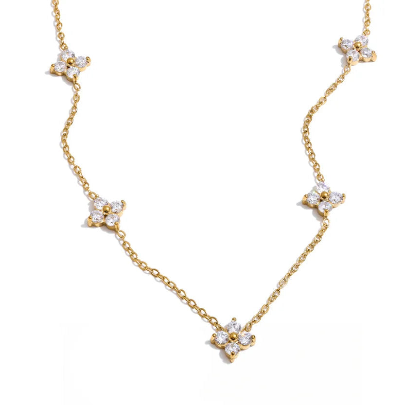 Gold necklace with cubic zirconia. butterfly clasp.