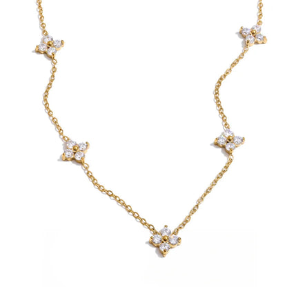 Gold necklace with cubic zirconia. butterfly clasp.