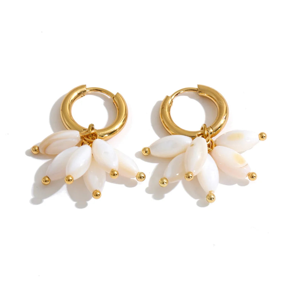 Dakota Earrings – gold huggie hoops with a fan of pearlescent petal charms. Tarnish-free stainless steel, 18k gold-tone. Lightweight and floral.
