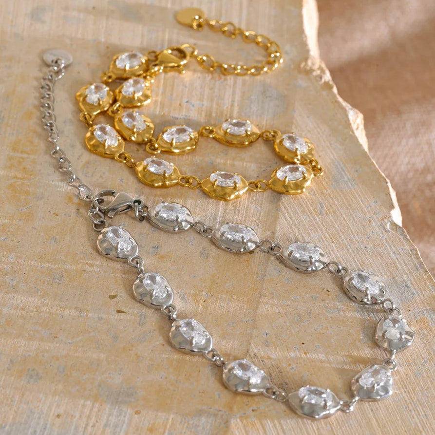 Shop the Eva Bracelet: sparkling oval zircon bracelet with a handcrafted look. Waterproof stainless steel, silver or 18k gold-tone.