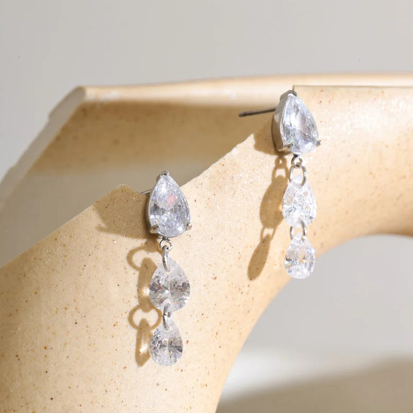 Frankie Earrings – cascading pear, round & marquise zircon drops. Tarnish-free stainless steel, silver or gold-tone. Everyday sparkle.