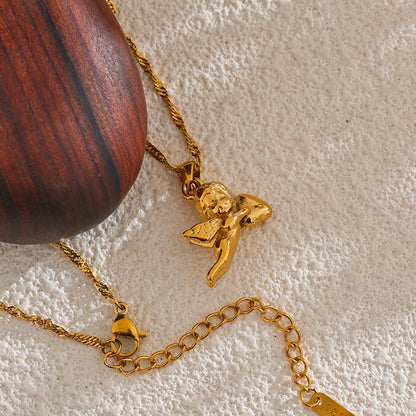 Gold necklace with a pendant on a textured surface