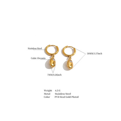 Shop the Helena Earrings: hinged huggies with a smooth oval drop and zircon accent. Waterproof stainless steel, silver or 18k gold.