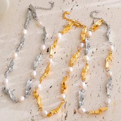 Shop the Julia Necklace: organic molten-link design with faux pearls. Available in gold, silver, or mixed metal finishes. Stainless Steel