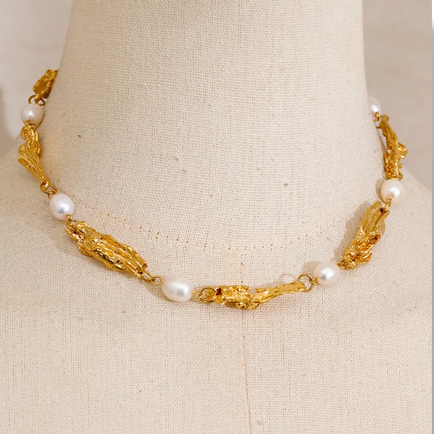 Shop the Julia Necklace: organic molten-link design with faux pearls. Available in gold, silver, or mixed metal finishes. Stainless Steel