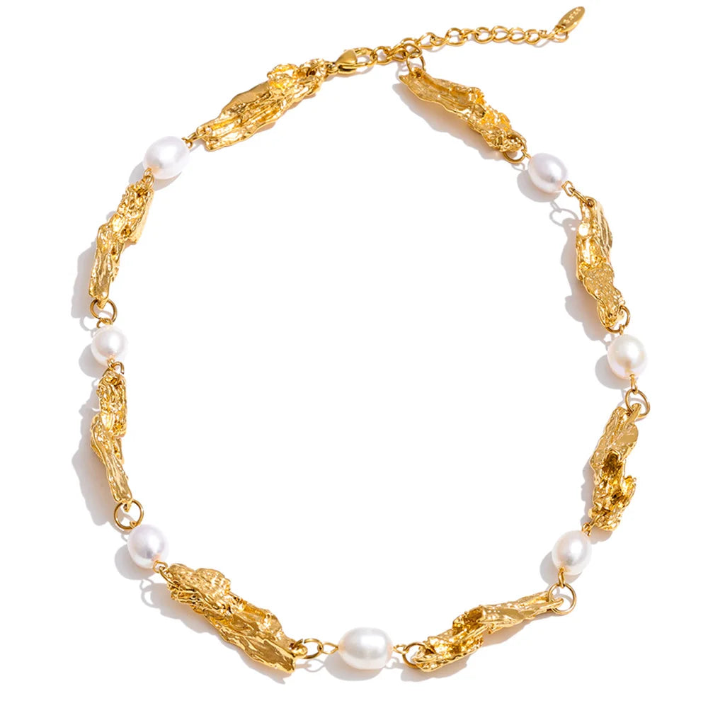 Shop the Julia Necklace: organic molten-link design with faux pearls. Available in gold, silver, or mixed metal finishes. Stainless Steel