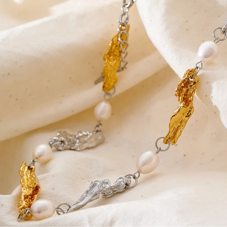 Shop the Julia Necklace: organic molten-link design with faux pearls. Available in gold, silver, or mixed metal finishes. Stainless Steel
