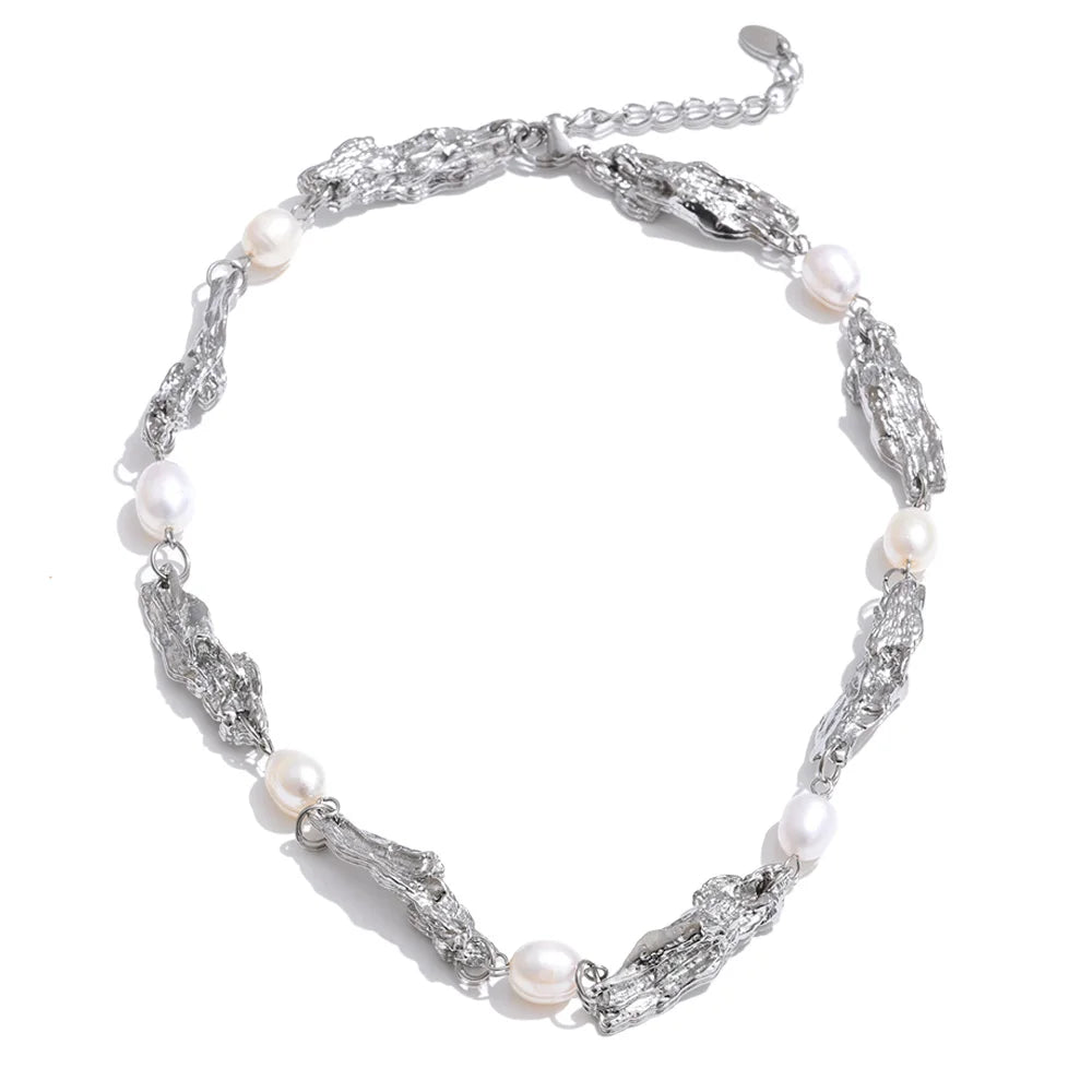 Shop the Julia Necklace: organic molten-link design with faux pearls. Available in gold, silver, or mixed metal finishes. Stainless Steel
