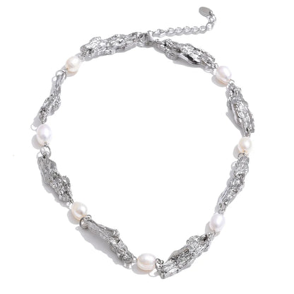 Shop the Julia Necklace: organic molten-link design with faux pearls. Available in gold, silver, or mixed metal finishes. Stainless Steel