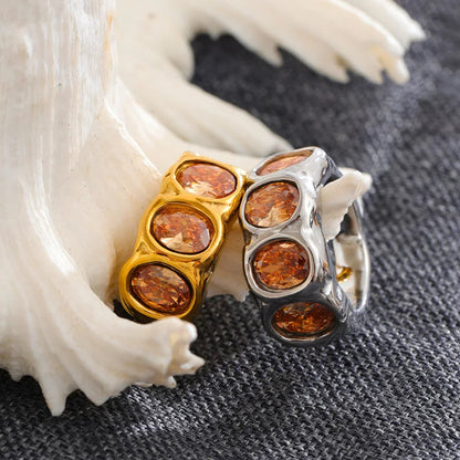 Maisie Ring – chunky hammered band with oval champagne zircons. Sizes 6-8. Tarnish-free stainless steel, silver or gold-tone. Bold statement.