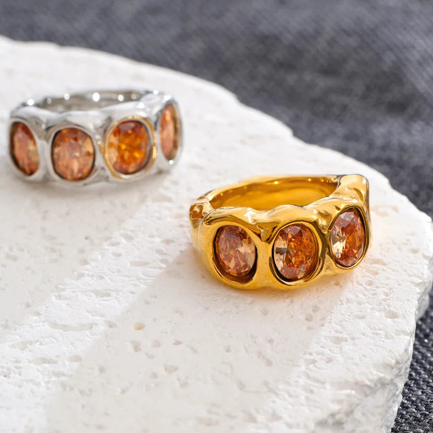 Maisie Ring – chunky hammered band with oval champagne zircons. Sizes 6-8. Tarnish-free stainless steel, silver or gold-tone. Bold statement.