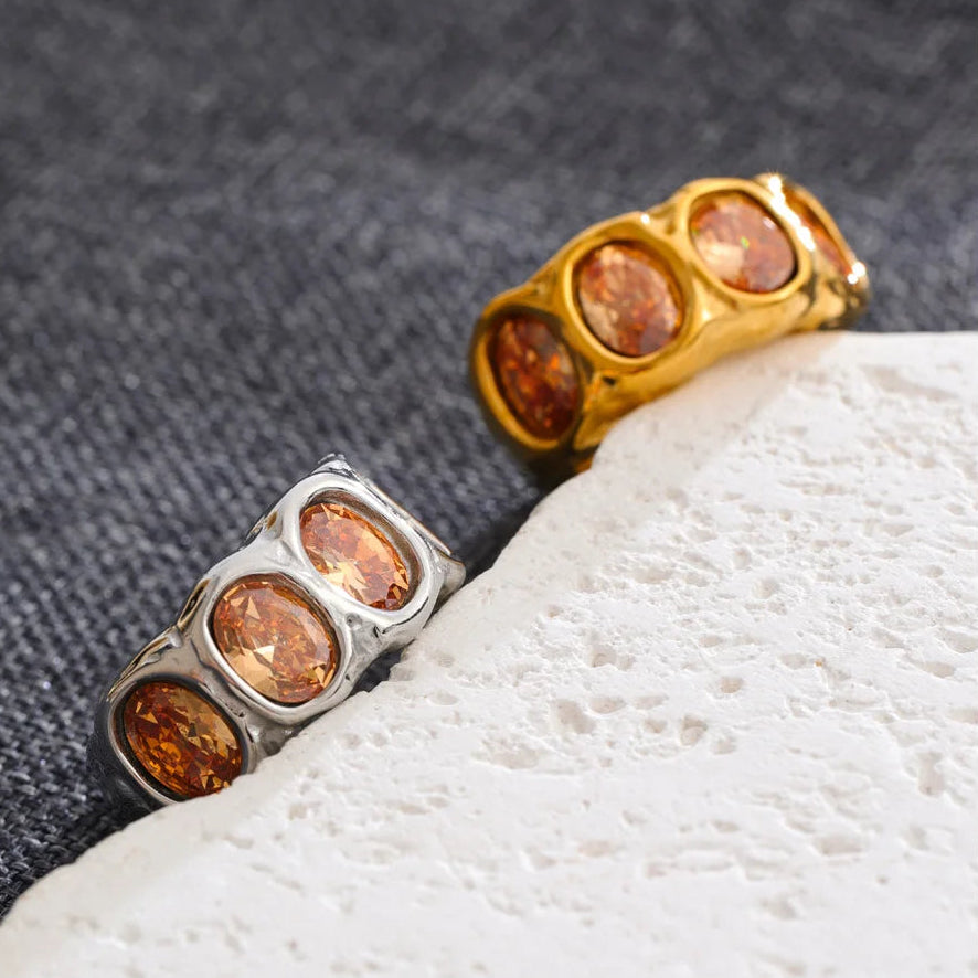 Maisie Ring – chunky hammered band with oval champagne zircons. Sizes 6-8. Tarnish-free stainless steel, silver or gold-tone. Bold statement.