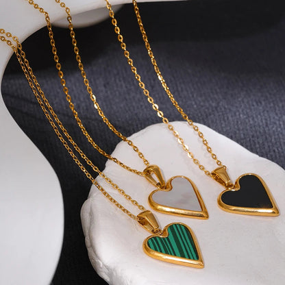 Shop the Milly Necklace: enamel heart pendant necklace in three colours. 18k gold-tone stainless steel, hypoallergenic.