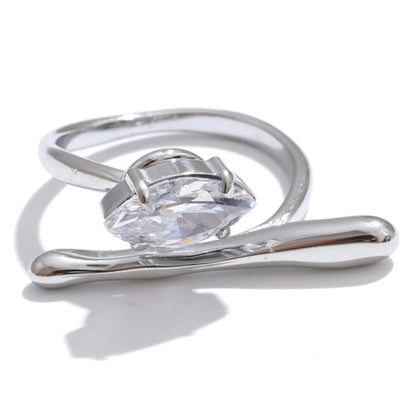 Silver stainless steel ring with a clear gemstone on a white background