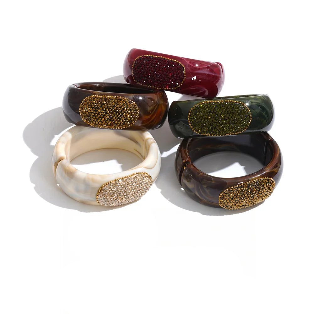 Ruby Bangle – chunky marbled resin bangle with a pavé crystal panel. Wine, espresso, jade or champagne. Hinged for easy wear.