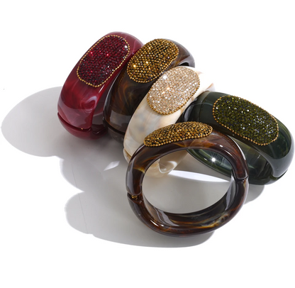 Ruby Bangle – chunky marbled resin bangle with a pavé crystal panel. Wine, espresso, jade or champagne. Hinged for easy wear.
