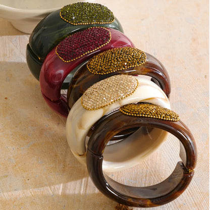 Ruby Bangle – chunky marbled resin bangle with a pavé crystal panel. Wine, espresso, jade or champagne. Hinged for easy wear.
