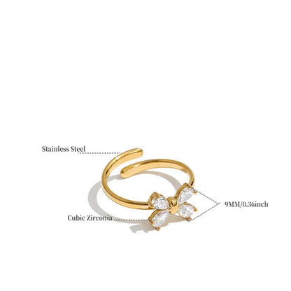 Gold-plated stainless steel open ring earring with cubic zirconia stones, shown on a white background with text labels indicating materials and dimensions.