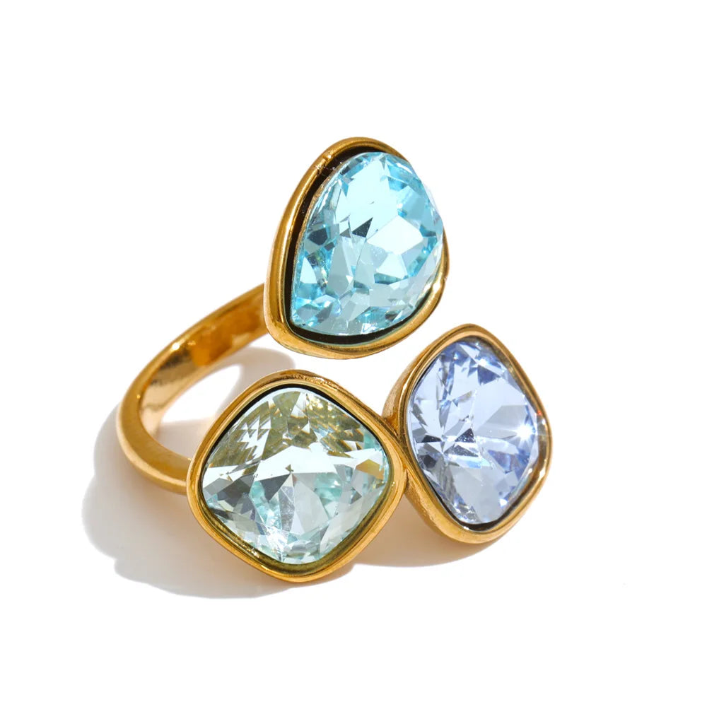 Sadie Ring – adjustable gold wrap ring with three gradient crystals in lilac, pink, green, aqua and more. Tarnish-free stainless steel.
