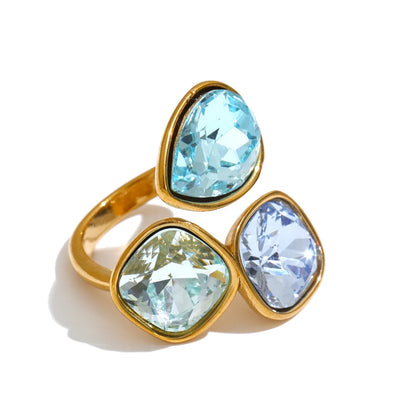 Sadie Ring – adjustable gold wrap ring with three gradient crystals in lilac, pink, green, aqua and more. Tarnish-free stainless steel.
