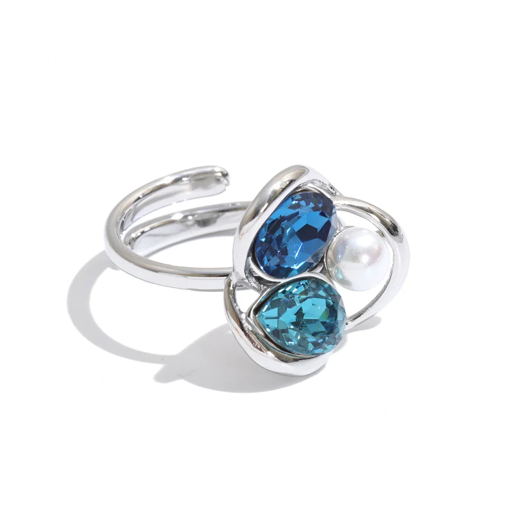 Keisha Ring – sculptural open-band ring with crystals and a faux pearl. Three colourways in silver or gold-tone. Adjustable, tarnish-free.