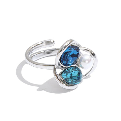 Keisha Ring – sculptural open-band ring with crystals and a faux pearl. Three colourways in silver or gold-tone. Adjustable, tarnish-free.