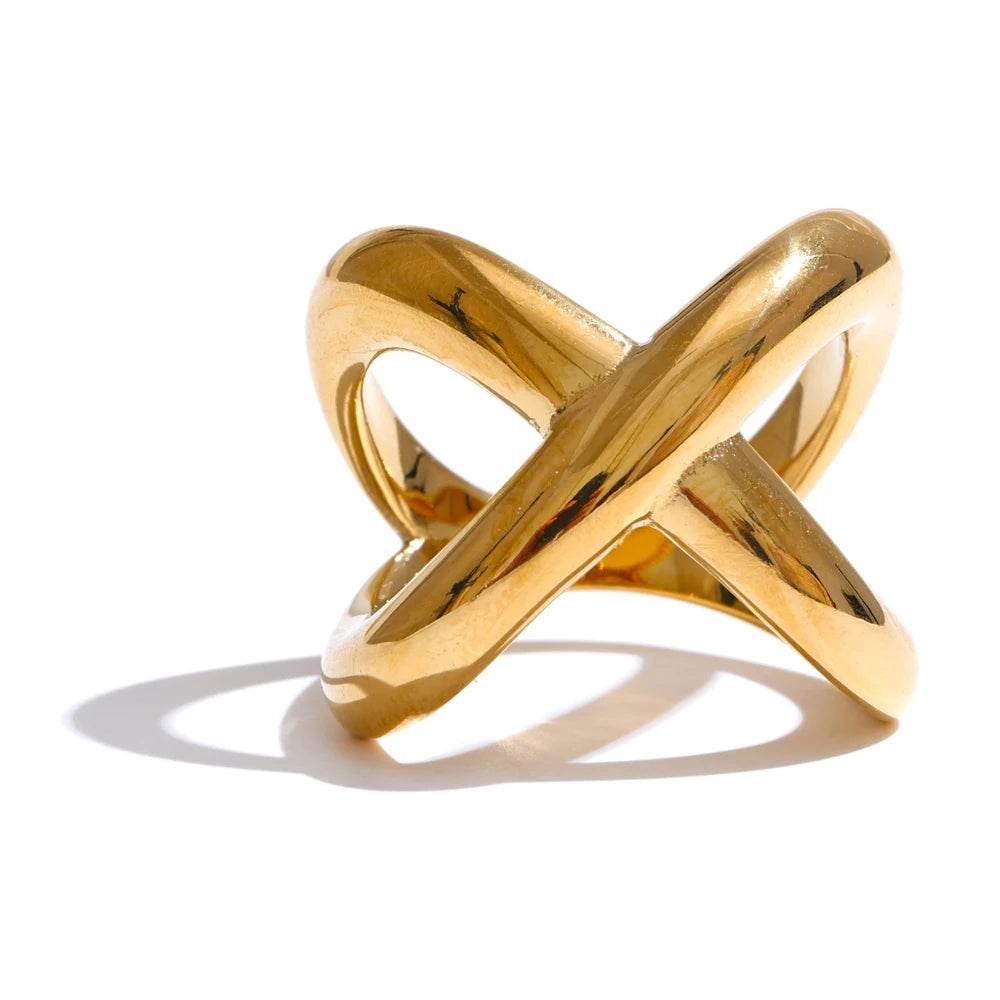Gold ring with a unique design on a white background,  stainless steel.