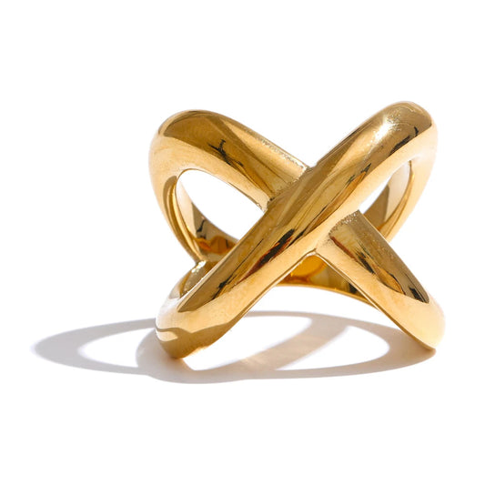 Gold ring with a unique design on a white background,  stainless steel.