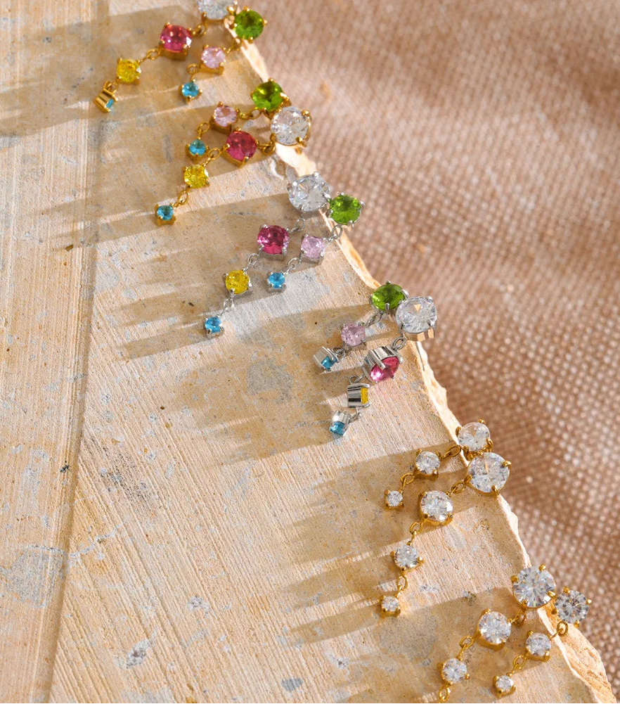 Tyla Earrings – cascading zircon drop earrings in multicolour or clear. Tarnish-free stainless steel, silver or gold-tone. Lightweight sparkle.