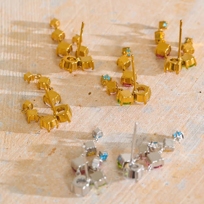 Tyla Earrings – cascading zircon drop earrings in multicolour or clear. Tarnish-free stainless steel, silver or gold-tone. Lightweight sparkle.
