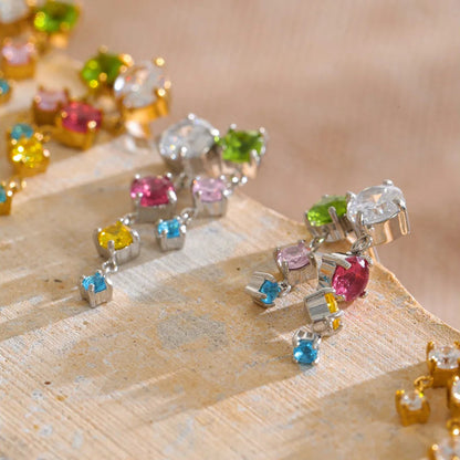 Tyla Earrings – cascading zircon drop earrings in multicolour or clear. Tarnish-free stainless steel, silver or gold-tone. Lightweight sparkle.