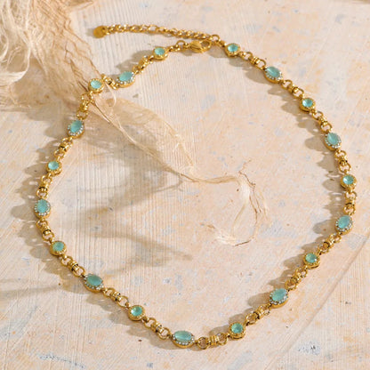 Vintage-inspired Vivienne Necklace: gold link chain with aqua-green stones and zircon halos. Tarnish-free stainless steel, adjustable fit.