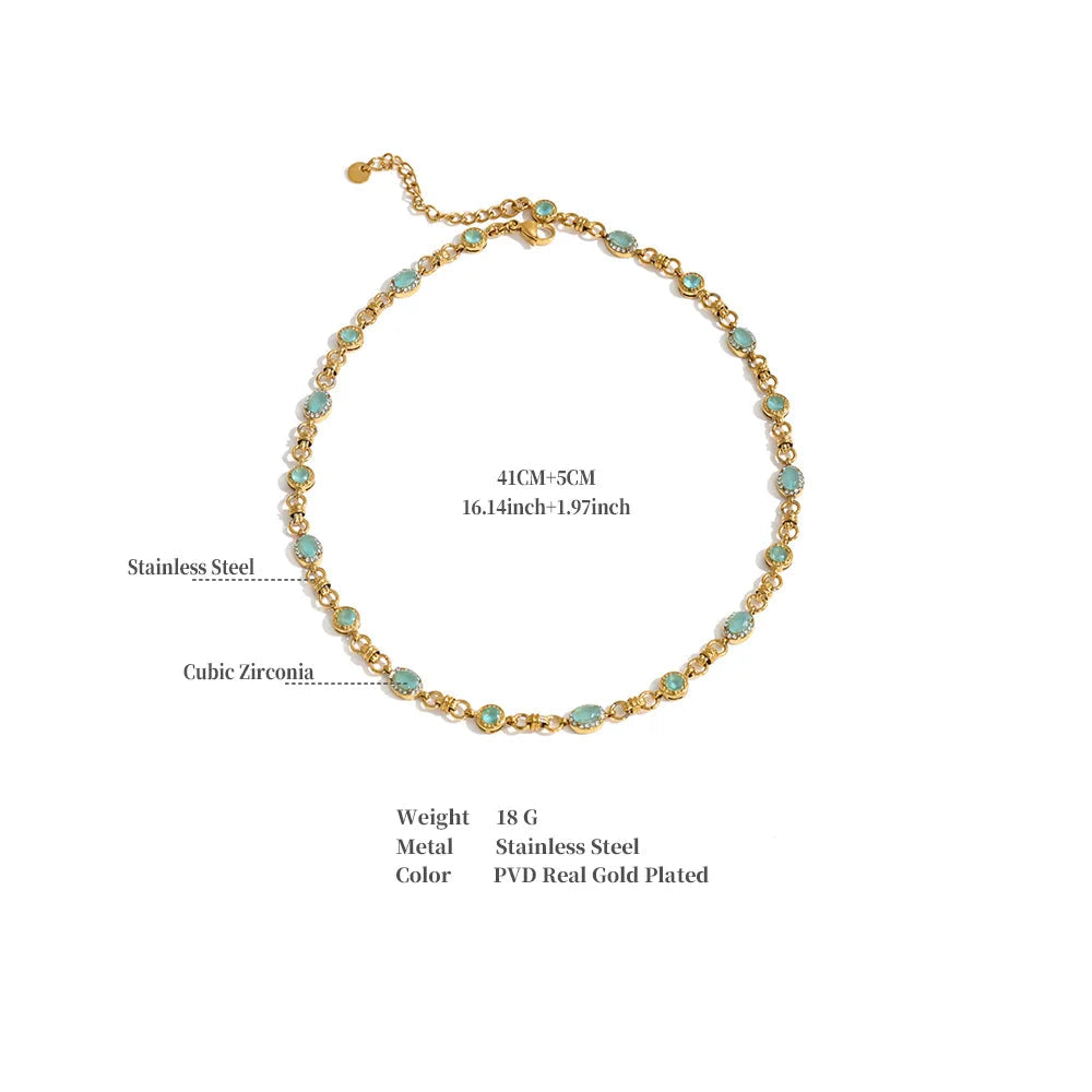 Vintage-inspired Vivienne Necklace: gold link chain with aqua-green stones and zircon halos. Tarnish-free stainless steel, adjustable fit.