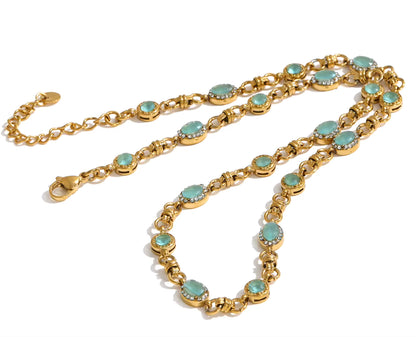 Vintage-inspired Vivienne Necklace: gold link chain with aqua-green stones and zircon halos. Tarnish-free stainless steel, adjustable fit.