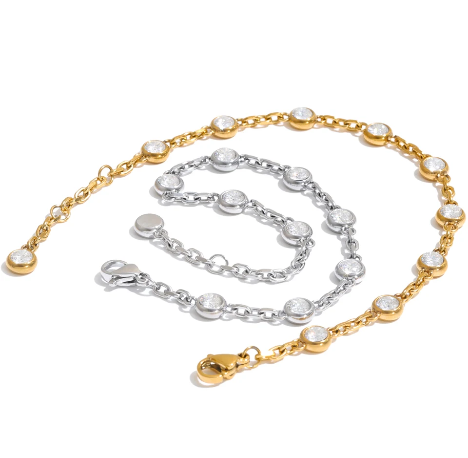 April Bracelet – dainty cable chain with bezel-set zircons. Tarnish-free stainless steel, silver or gold-tone. Adjustable, everyday sparkle.