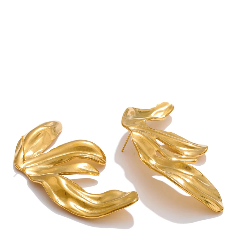 Two stainless steel gold leaf-shaped earrings displayed on a clean white background with the text