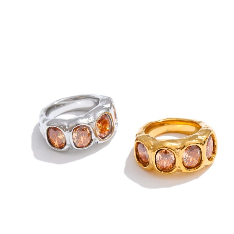 Maisie Ring – chunky hammered band with oval champagne zircons. Sizes 6-8. Tarnish-free stainless steel, silver or gold-tone. Bold statement.