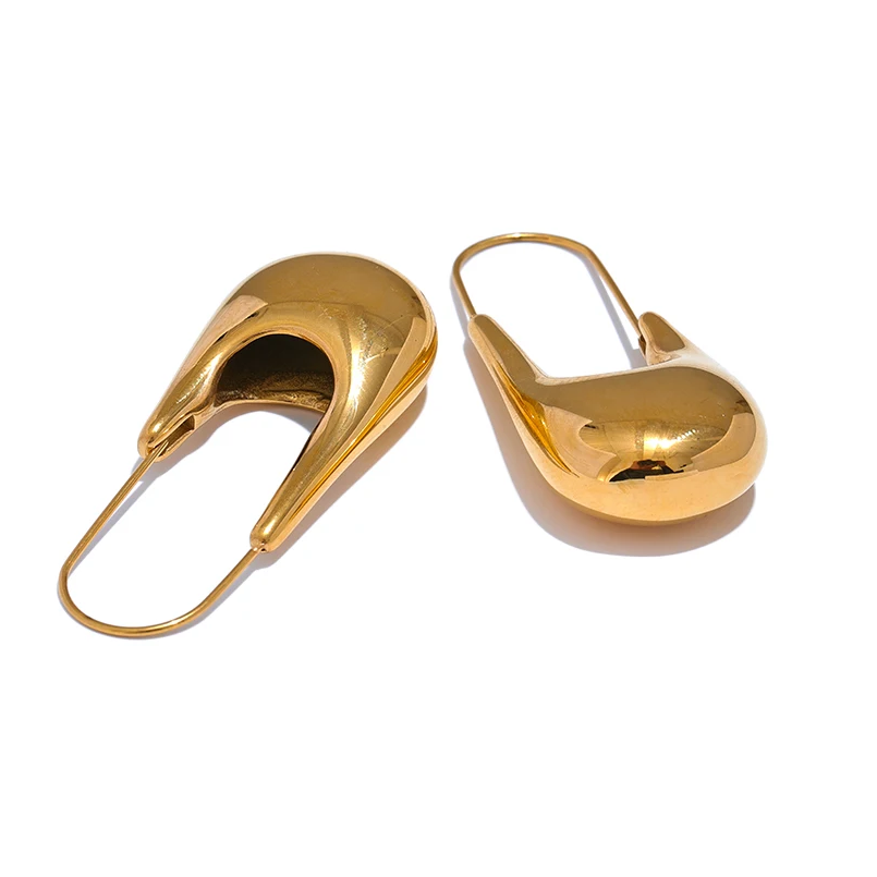 Gold earrings on a white background Stainless steel waterproof